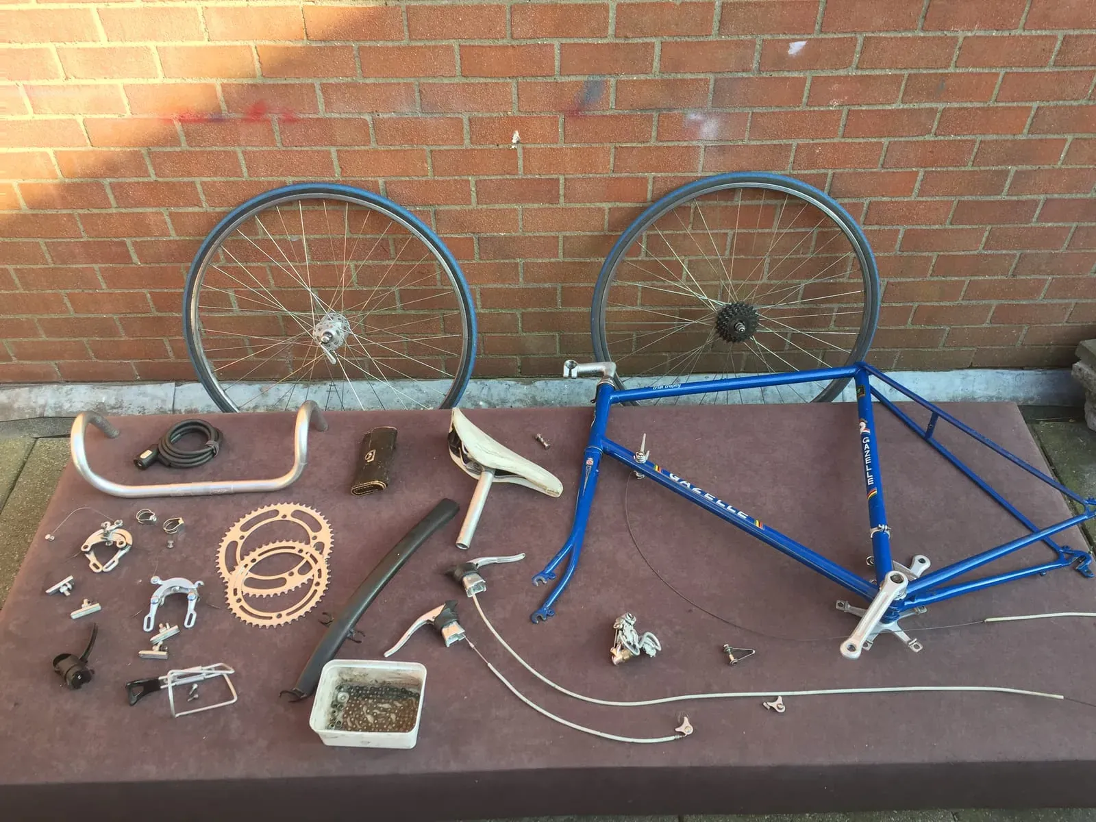 Racebike parts before restoration