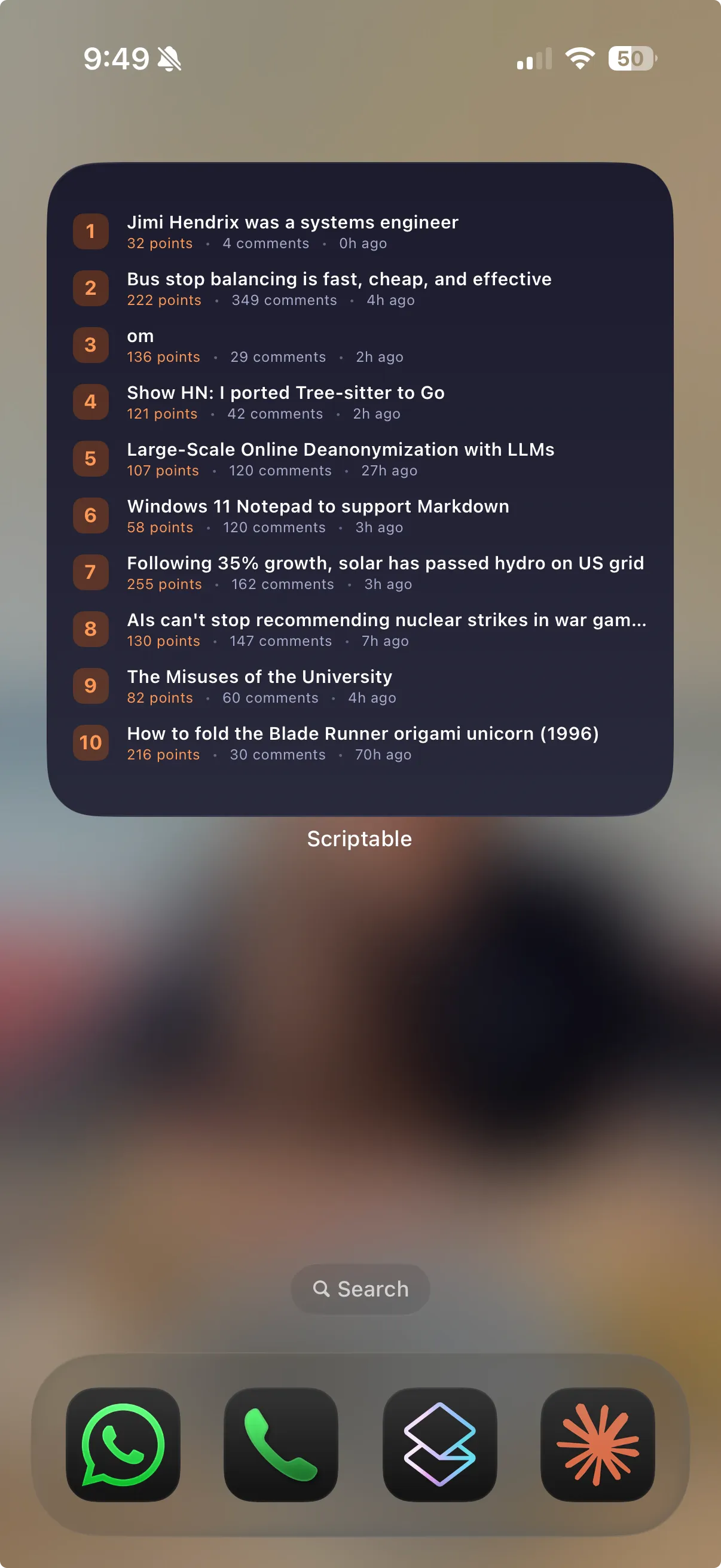 Large Scriptable widget on an iPhone home screen listing the top 10 Hacker News stories, each with an orange rank badge, a one-line title and a line with points, comment count and age in hours